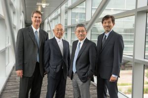 CSU collaborators Jac Nickoloff, far left, and Max Matsuura, far right, have worked with partners Dr. Hirohiko Tsujii and Dr. Tadeshi Kamada on the carbon-ion project.
