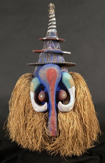 Yaka artist (Democratic Republic of the Congo); Tsekedii mask, 20th century; wood with cloth, pigment, and raffia. University Art Museum, CSU, gift of John A. and Mary Pat Carlen, 2008.