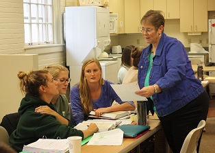 Dr. Atler (right) interacting with some of her students