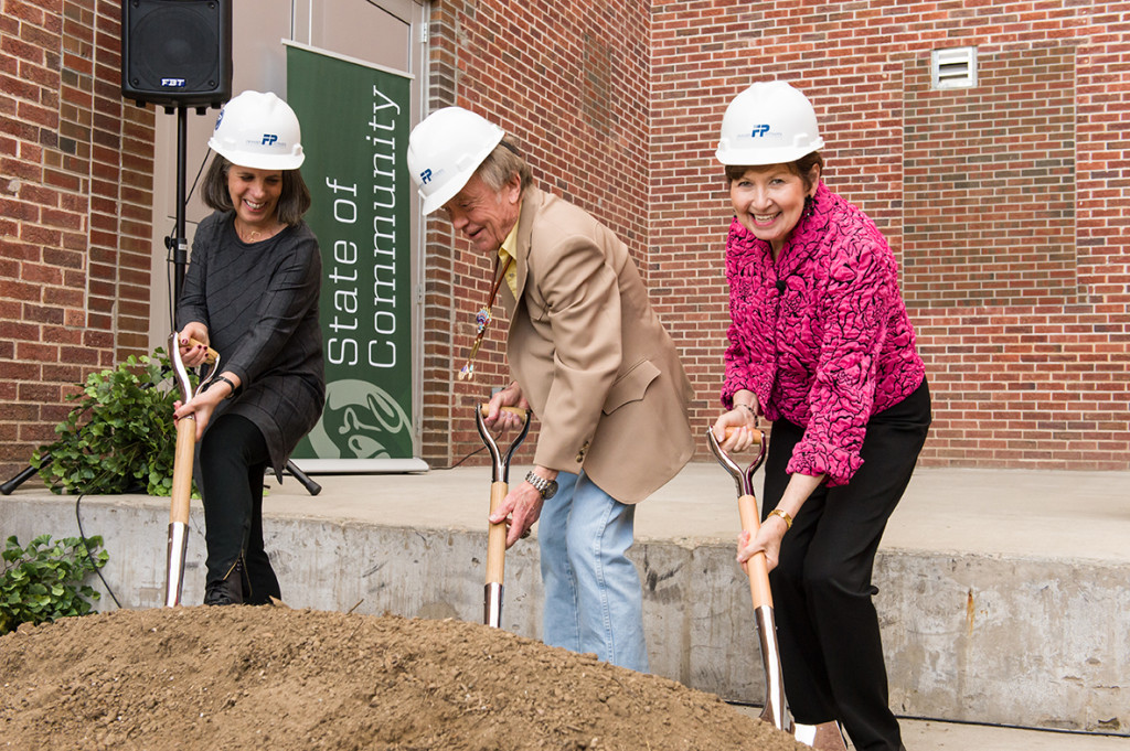 From left, Linny Frickman, Torleif Tandstad and Dorothy Horrell dig in at the groiundbreaking.