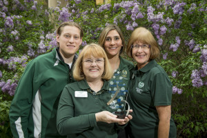 Left to right, Dustin Sabo, Kathy Klein, Liz Schwebach and Sue Hendrickson win the College Fish Transfer Champion Award, April 30, 2015.