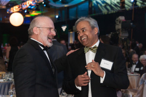 Menon speaks with former College of Business Associate Dean John Olienyk at the 1870 Dinner marking the completion of the $500 Million Campaign for CSU on Feb. 4, 2012.