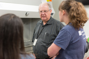 Ellis speaks with students in the mock BSL-3 lab on the Foothills Campus.