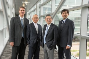 From left are Nickoloff, NIRS Fellow and International Open Lab founder Hirohiko Tsujii, NIRS Research Center for Charged Particle Therapy Director Tadashi Kamada, and Matsuura at a symposium in July 2014. 