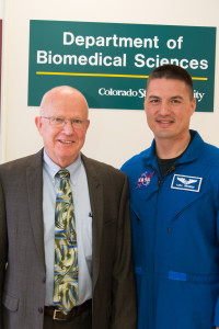 CSU Biomedical Sciences professor C.W. Miller welcomes NASA astronaut Kjell Lindgren to campus, April 17, 2014. (Photo by William A. Cotton/CSU Photography)