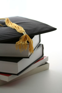 Graduation cap and textbooks