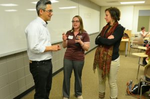 Ishiwata, left, speaks with Fort Morgan High School teachers Denise Gondrez and Taylor Jordan during their visit to CSU last spring.