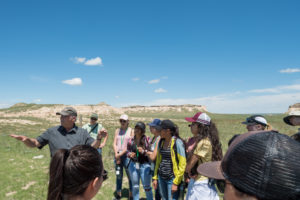 color photo of CSU's John Moore and students at Pawnee National Grassland