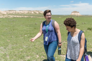 Color photo of two high school students at Pawnee National Grassland