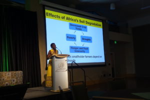 Esther Ngumbi presenting at soils conference
