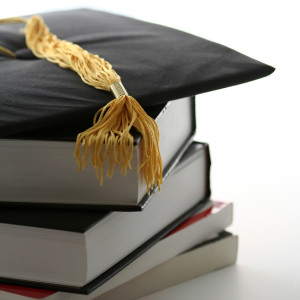 Graduation cap and books
