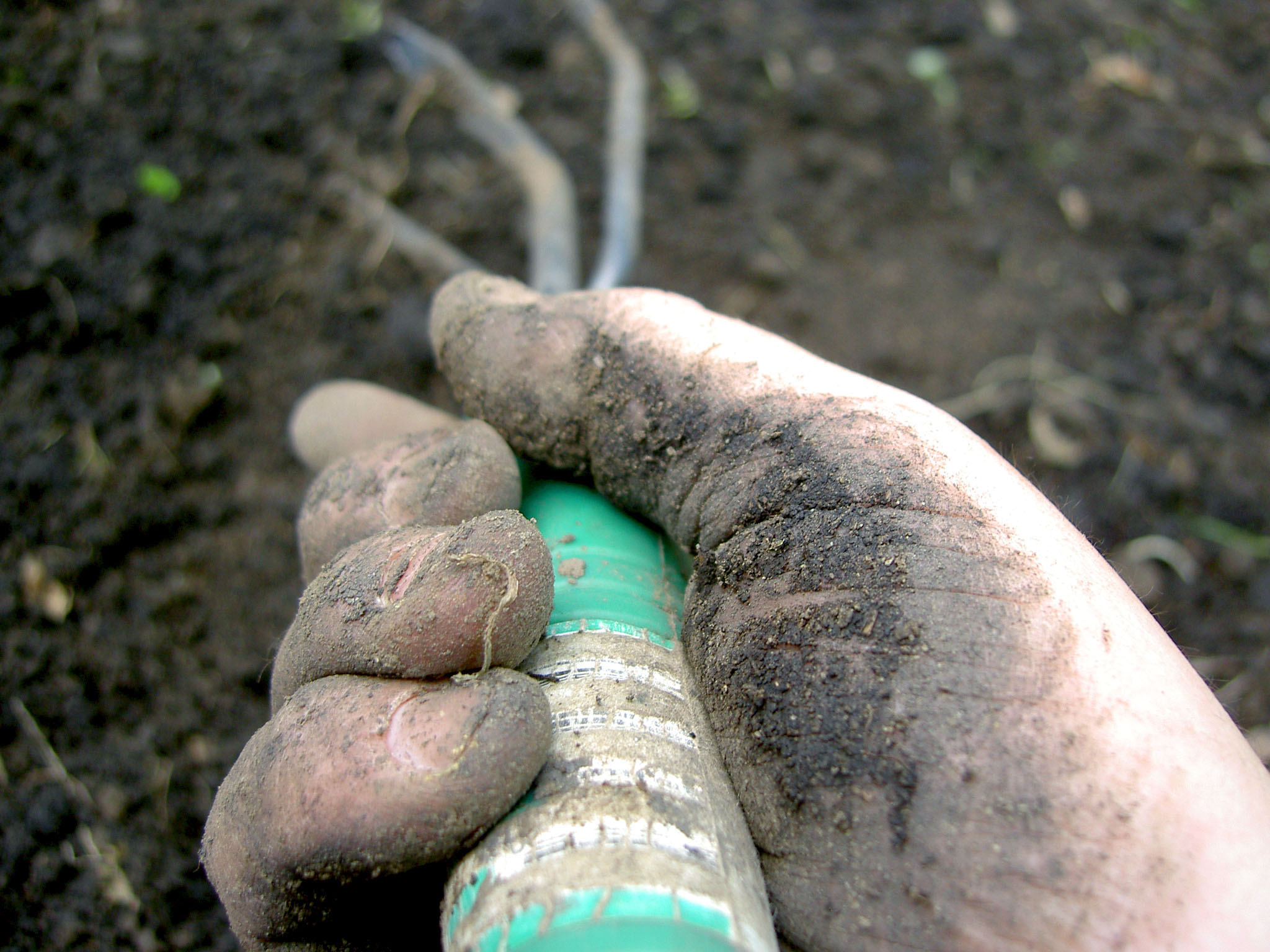 hand rake and soil