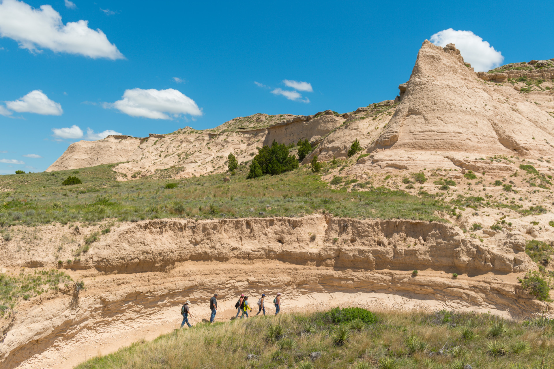 From a distance, students walking in Pawnee National Grassland