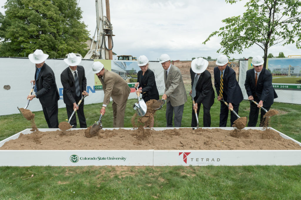 color photo of donors, university leaders at groundbreaking event with shovels