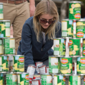 Student with cans