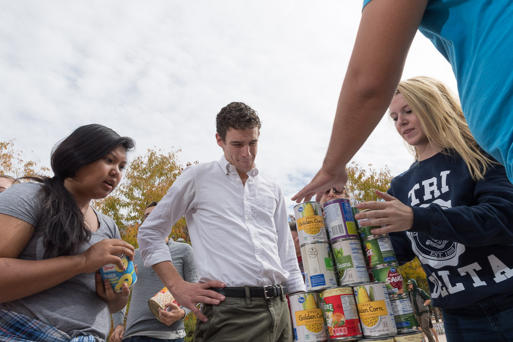 Students make sculptures from donated canned food that represent "Home" during Canstruction on The Plaza at Colorado State University. October 11, 2017