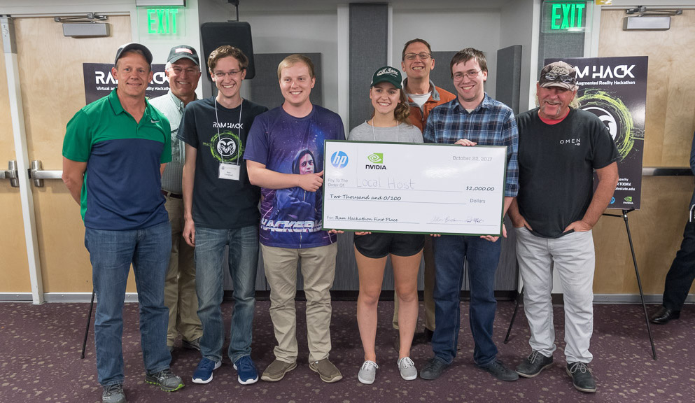 Team Local Host accepts the first place award, sponsored by HP and Nvidia,  after creating a VR project in 48 hours at Colorado State University's 2017 Virtual and Augmented Reality Hackathon. October 20, 2017