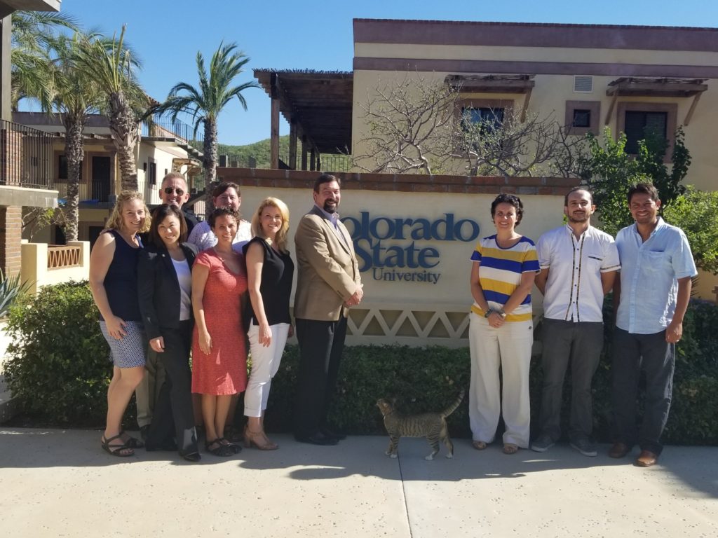 Group of people in front of CSU sign at Todos Santos