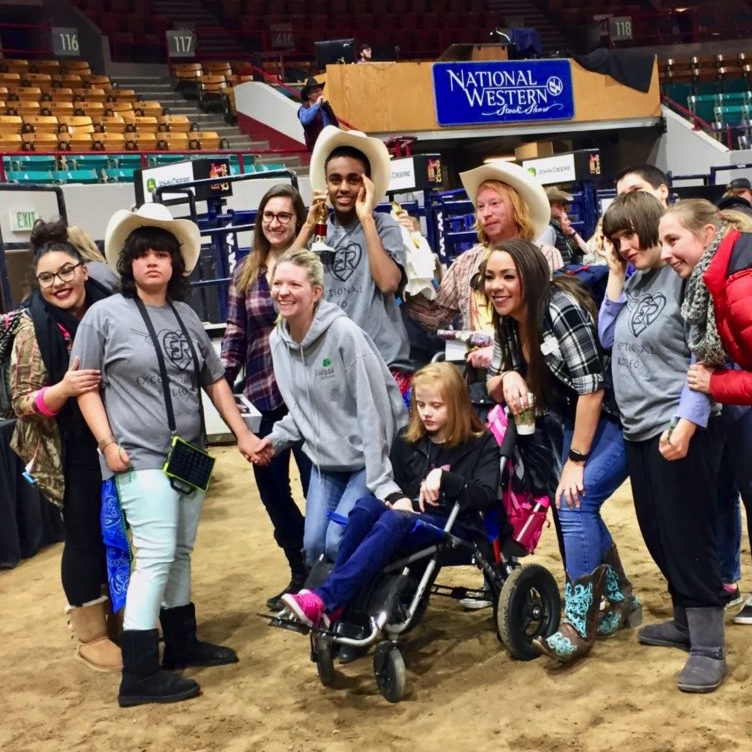 Exceptional rodeo participants pose for group photo.