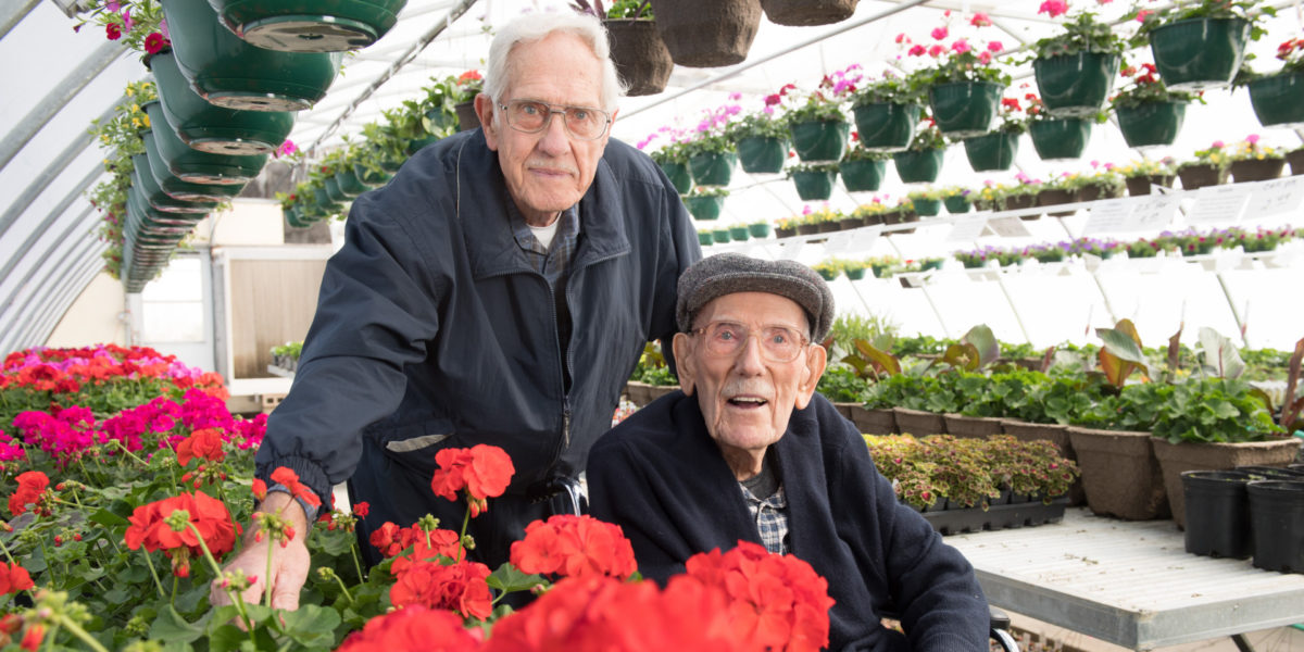 Ken Goldsberry and Carl Jorgensen in greenhouse