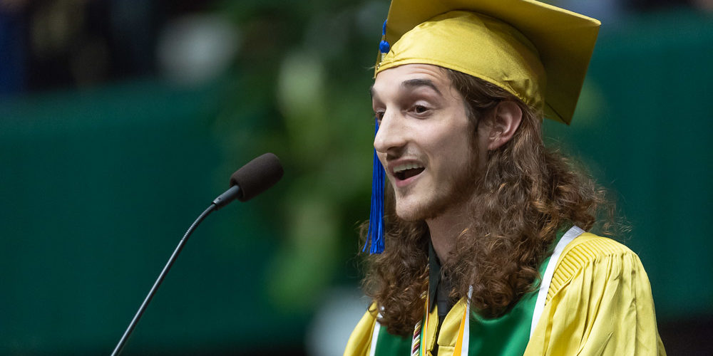 Student speaking at commencement