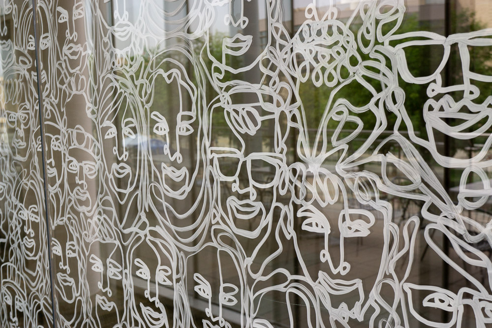 Faces painted on window