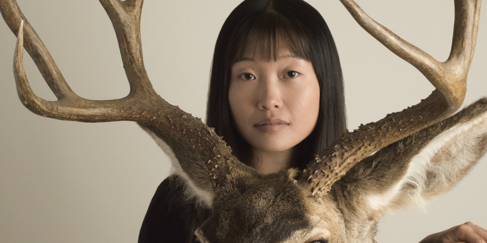 STUDENT WITH DEER ANTLERS