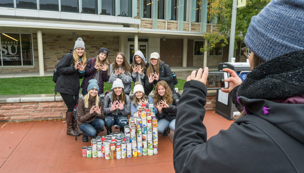Students with cans