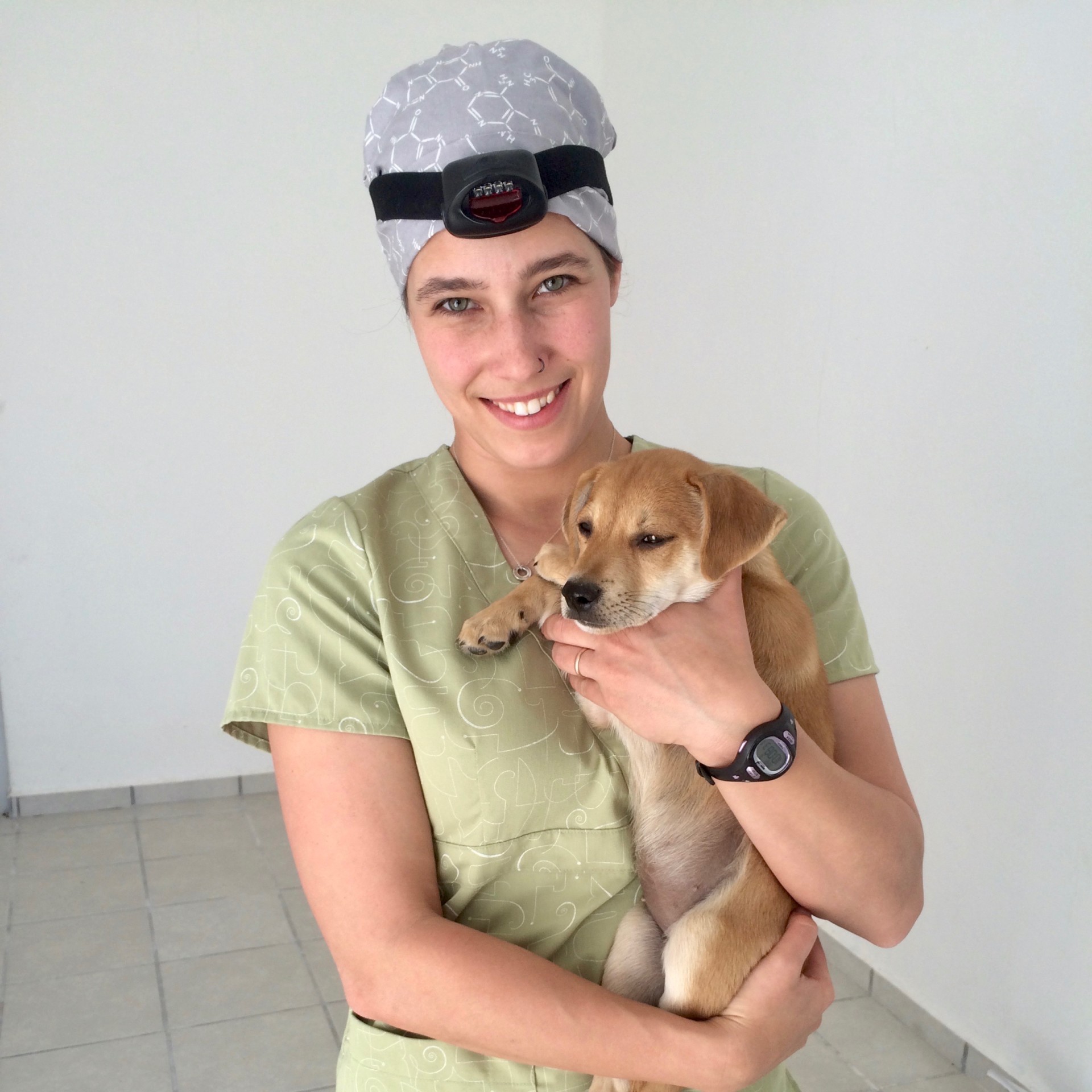 Emma Lantz holding puppy.