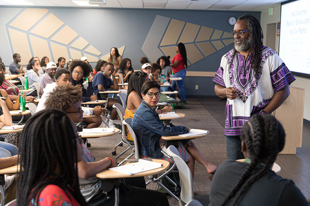Colorado State University Ethnic Studies professor Ray Black leads a discussion on resistance during Black Issue's Forum, June 13, 2019.