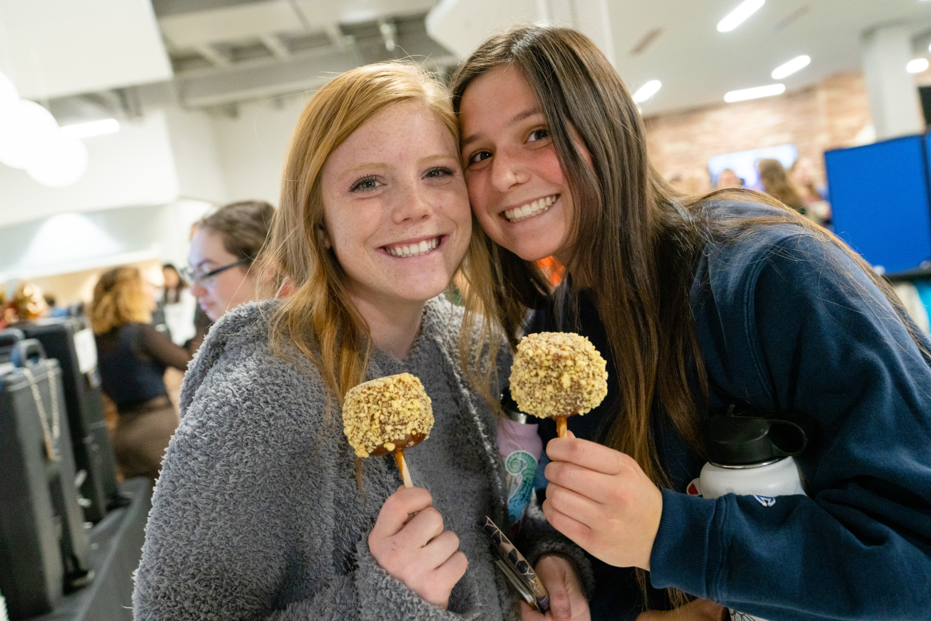 Students with caramel apples