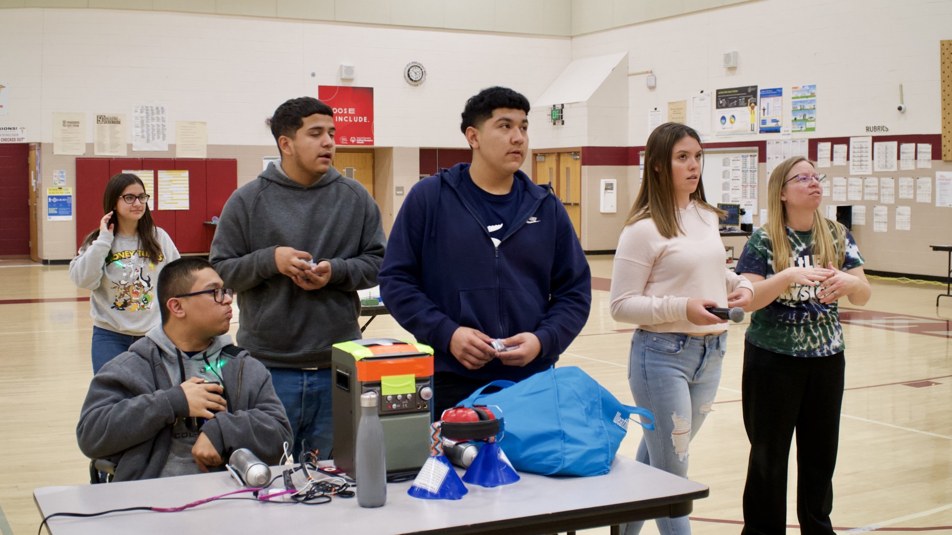 Little Shop of Physics 11th-grade mentors from Bruce Randolph School welcome students to gymnasium to experience LSOP experiments.