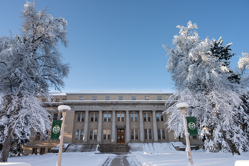 The sun comes up after a heavy spring snow blankets campus, April 17, 2020