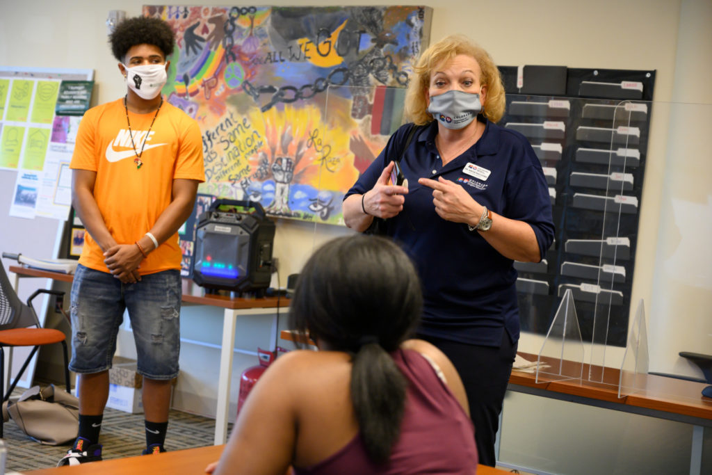 Colorado Department of Higher Education Executive Director and Colorado State University alumnus Angie Paccione talks with students in the Black/African American Cultural Center on the first day of fall semester classes, August 24, 2020, during the COVID-19 outbreak.