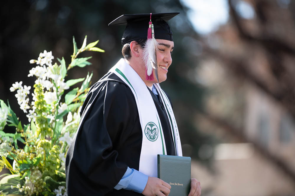 Colorado State University College of Health and Human Sciences graduates are celebrated at the Ceremonial Walk Across the Oval, December 20, 2019.