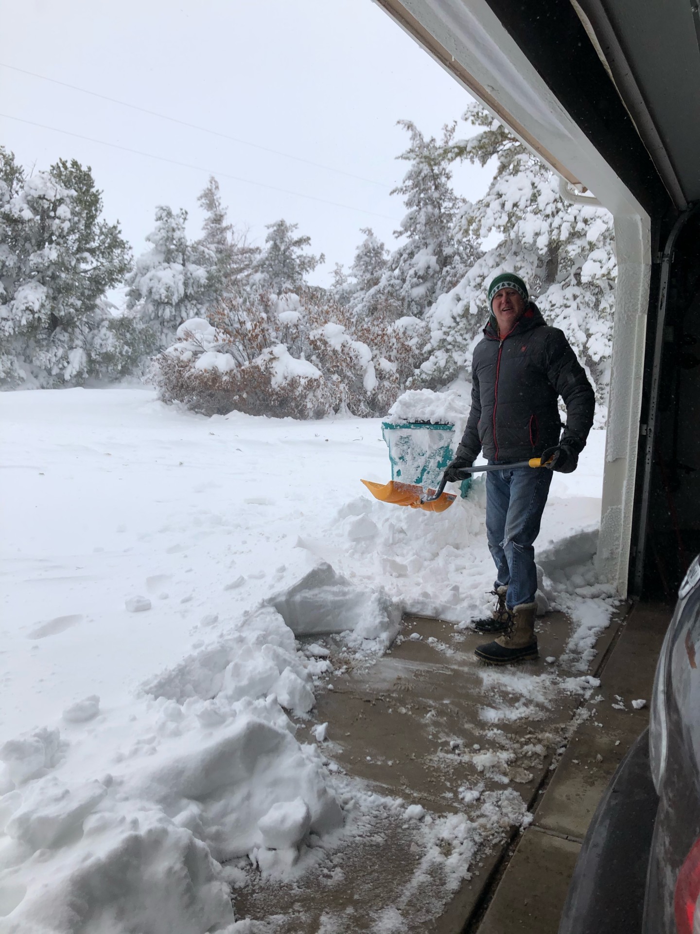 Erik Wilmsen shoveling snow March 14, 2021