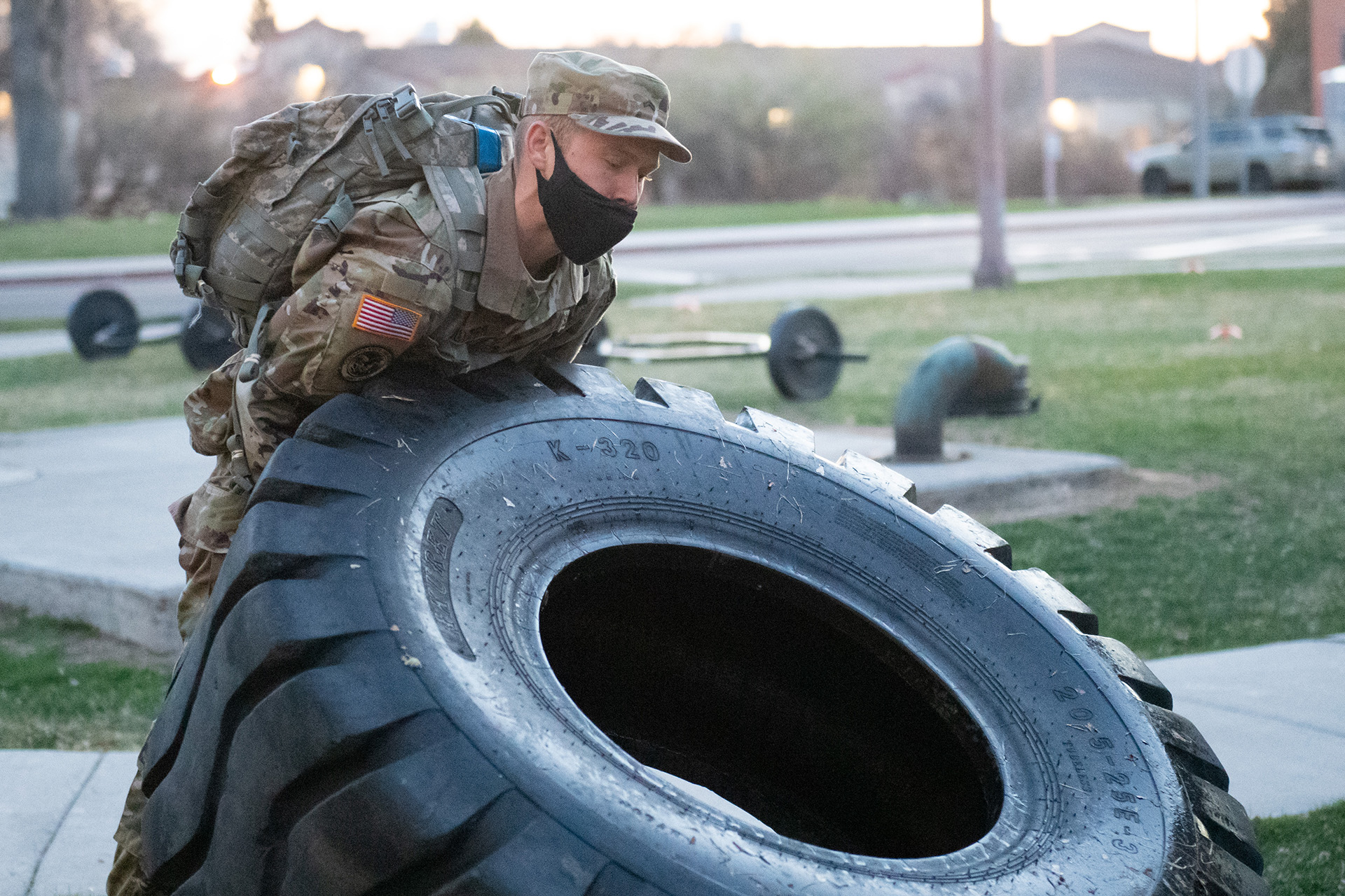 CSU Army ROTC cadet flipping a big tire