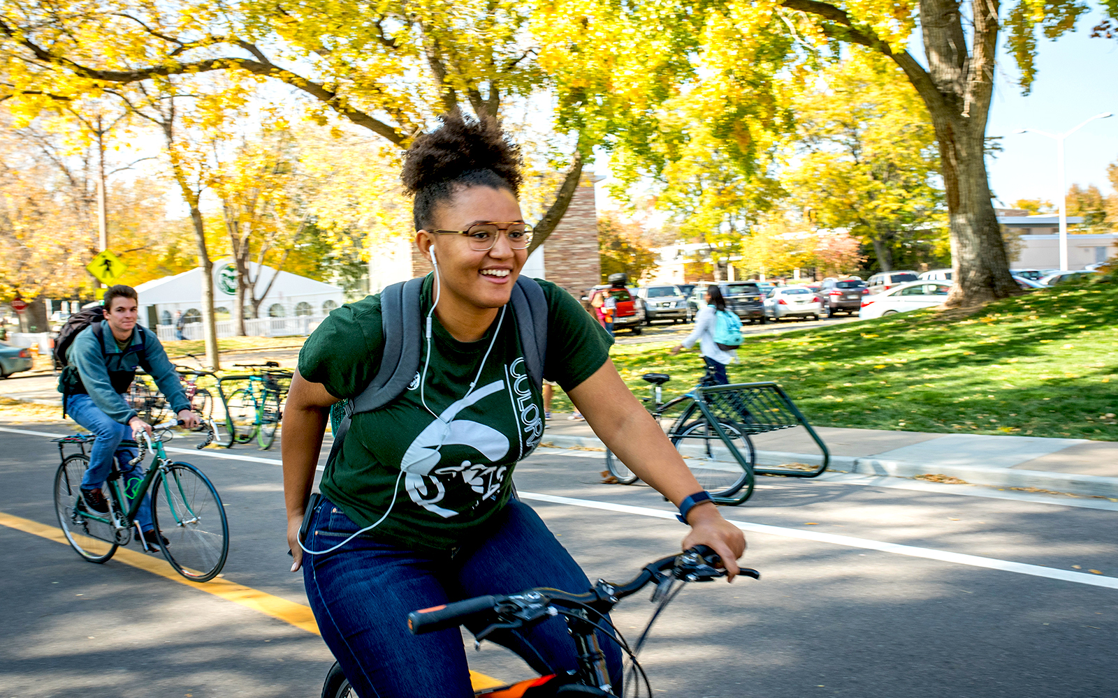 Student riding on bike