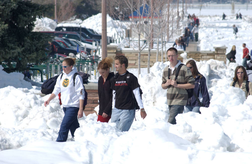 March 2003 blizzard snow piles students