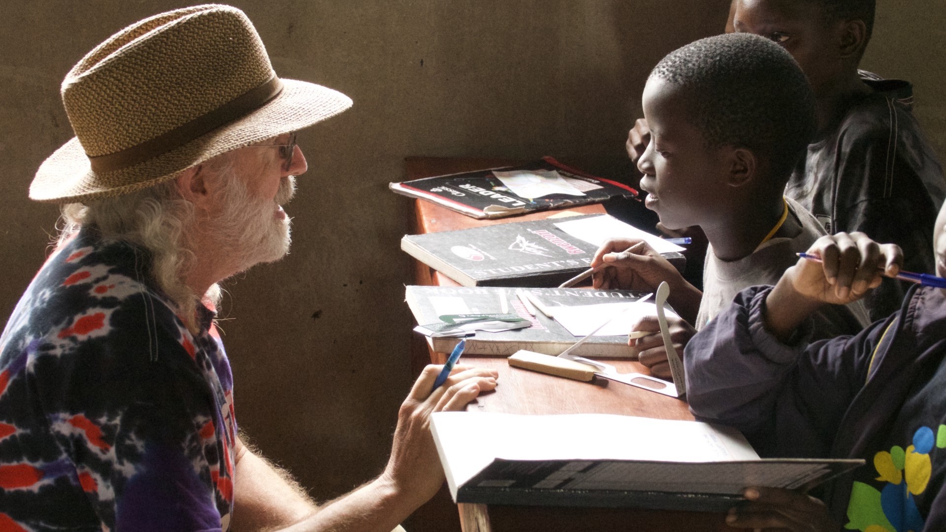 Brian Jones visiting students in Uganda
