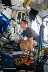 Lindgren uses exercise equipment to stay in shape aboard the International Space Station.