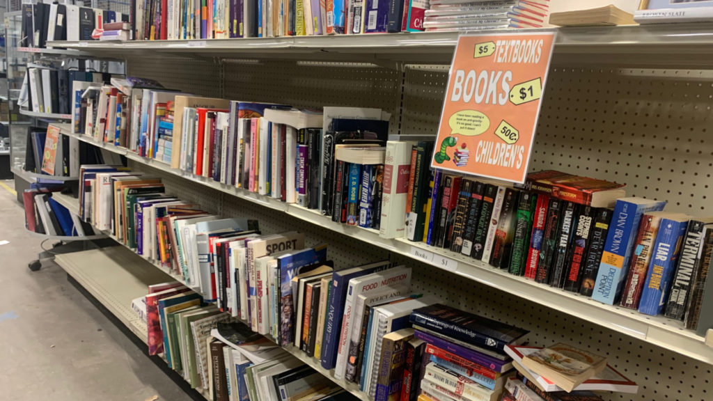 Shelf of books at CSU Surplus