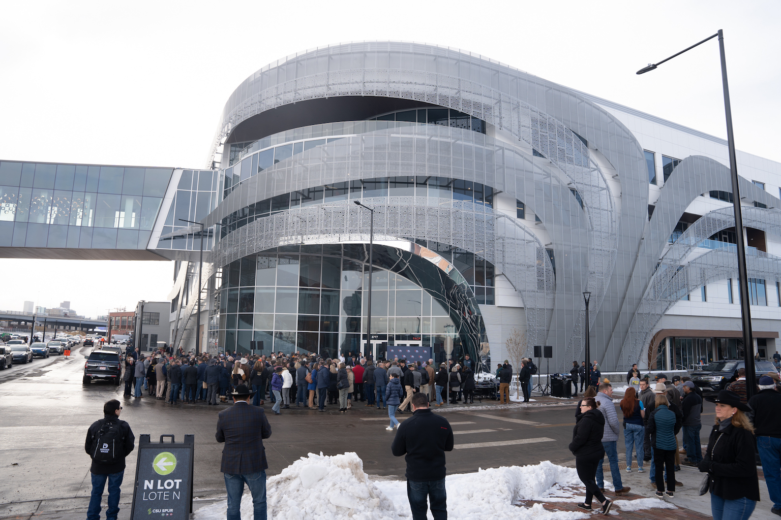 People gather outside the newly opened Hydro building.