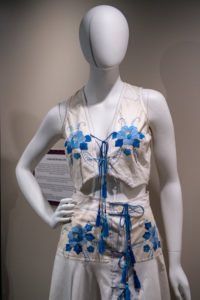 photo of white and blue garment