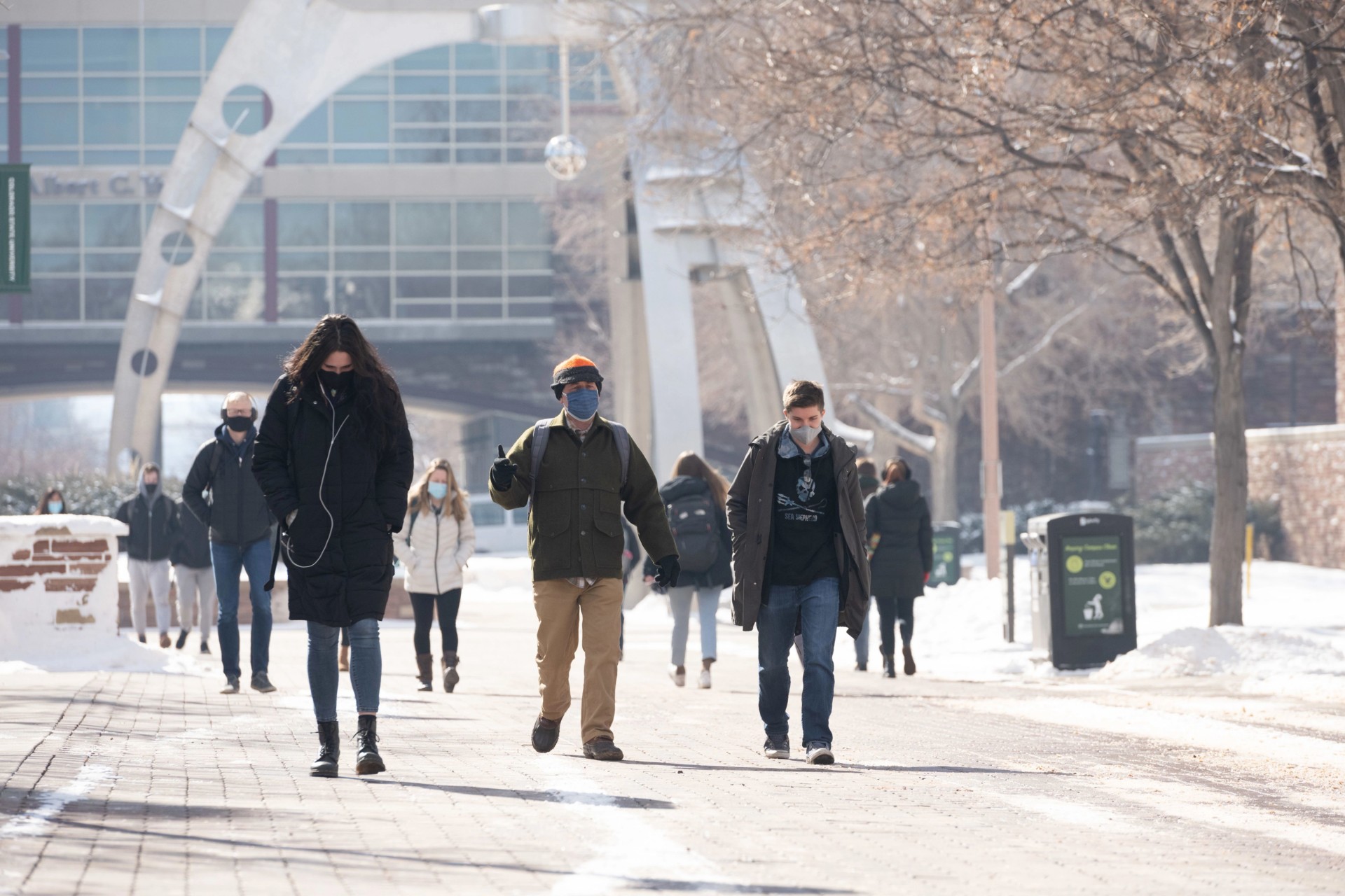 CSU students walk through campus in face masks