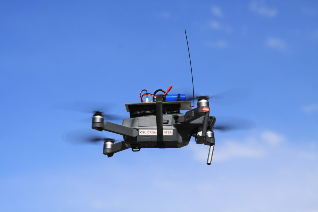 A drone prototype developed by the Colorado State University Drone Center flies in the air