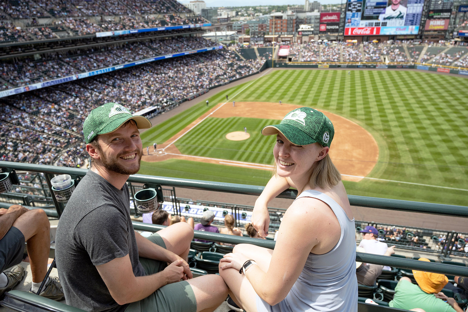 A couple enjoys the 2022 Rams at Rockies game.