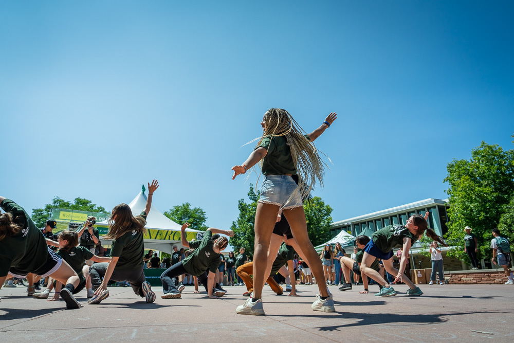 Colorado State University launches its new brand campaign "FInd Your Energy" with music playlists by KCSU DJs, free T-Shirts, buttons, and cookies along with an impromptu dance flashmob all on the first day of classes on the Lory Student Center plaza at Colorado State University, August 21, 2023