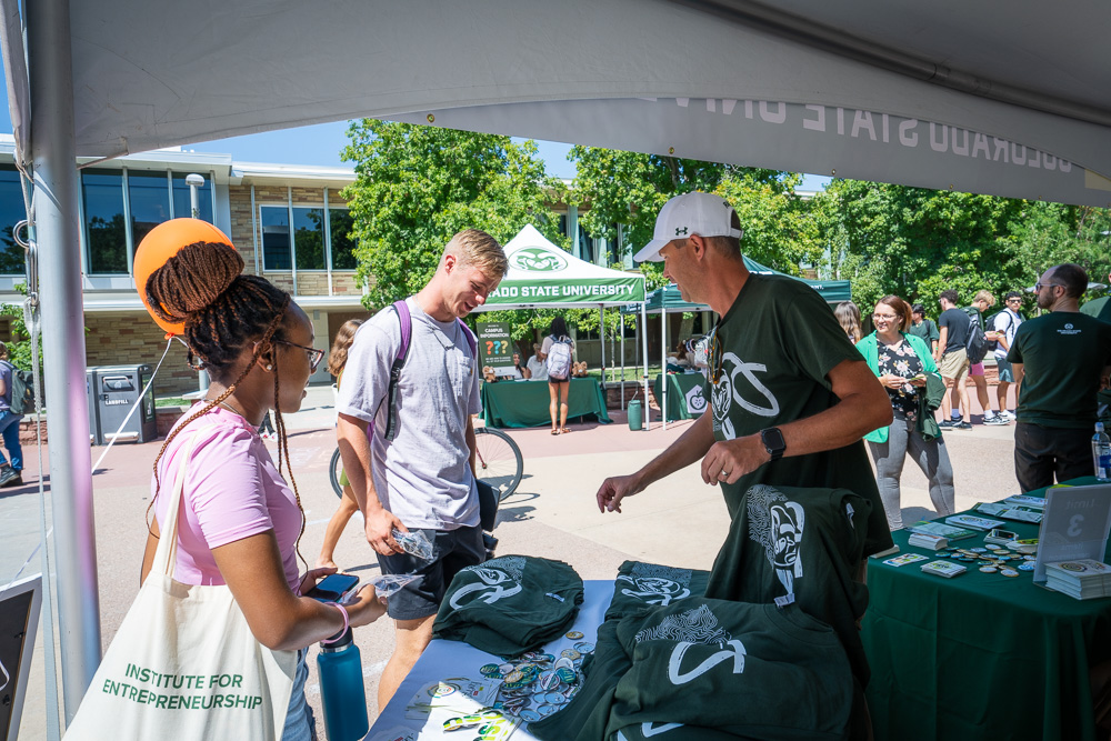 Colorado State University launches its new brand campaign "FInd Your Energy" with music playlists by KCSU DJs, free T-Shirts, buttons, and cookies along with an impromptu dance flashmob all on the first day of classes on the Lory Student Center plaza at Colorado State University, August 21, 2023