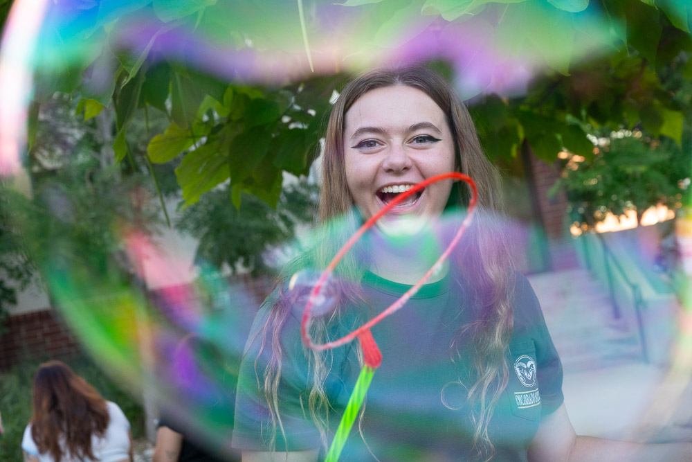 Student behind a bubble